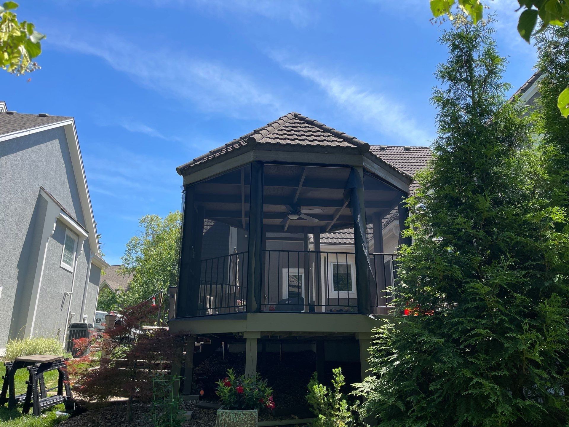 Custom deck and outdoor living space by Uprise Remodeling