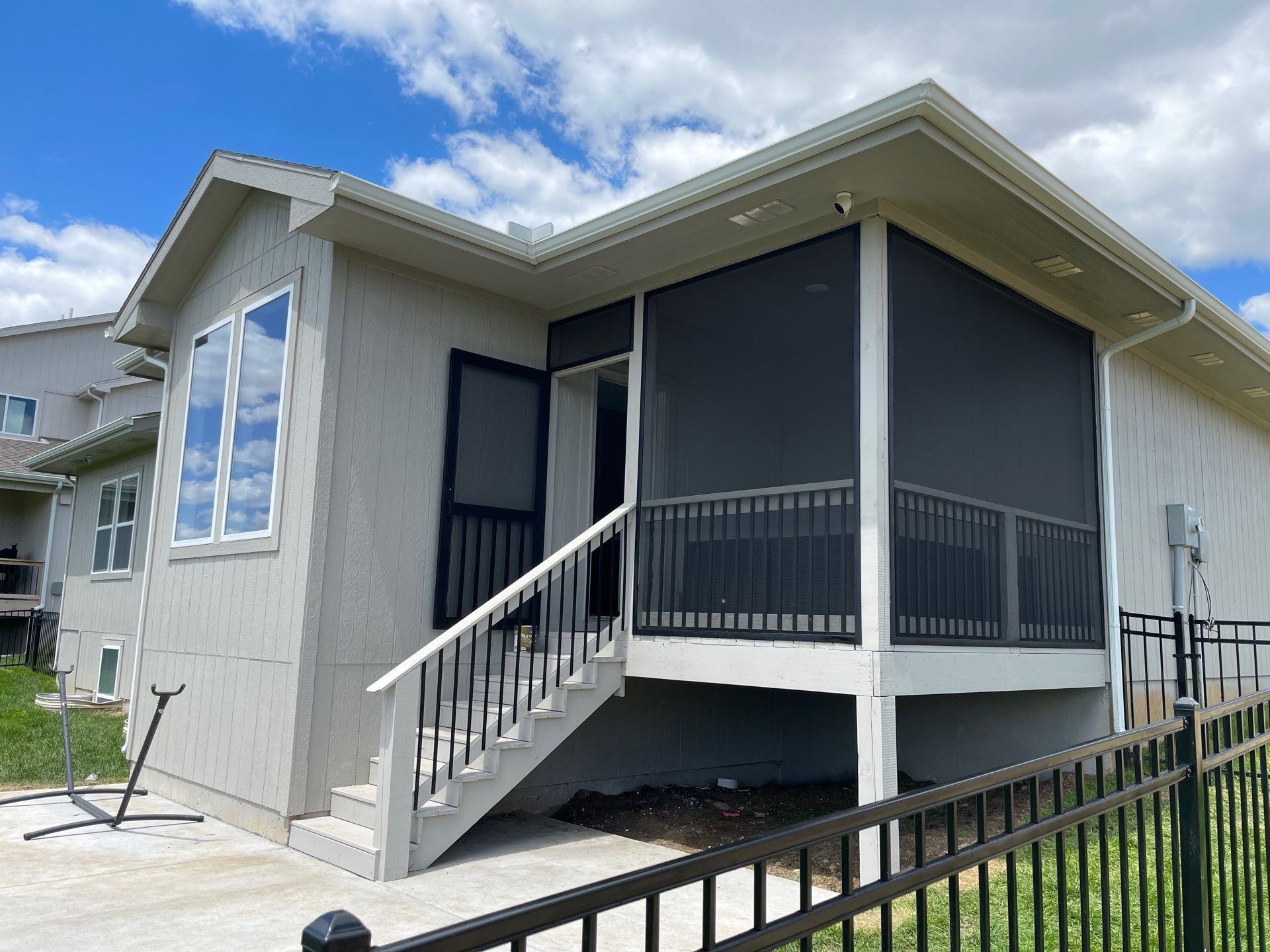 Screened porch built by Uprise Remodeling