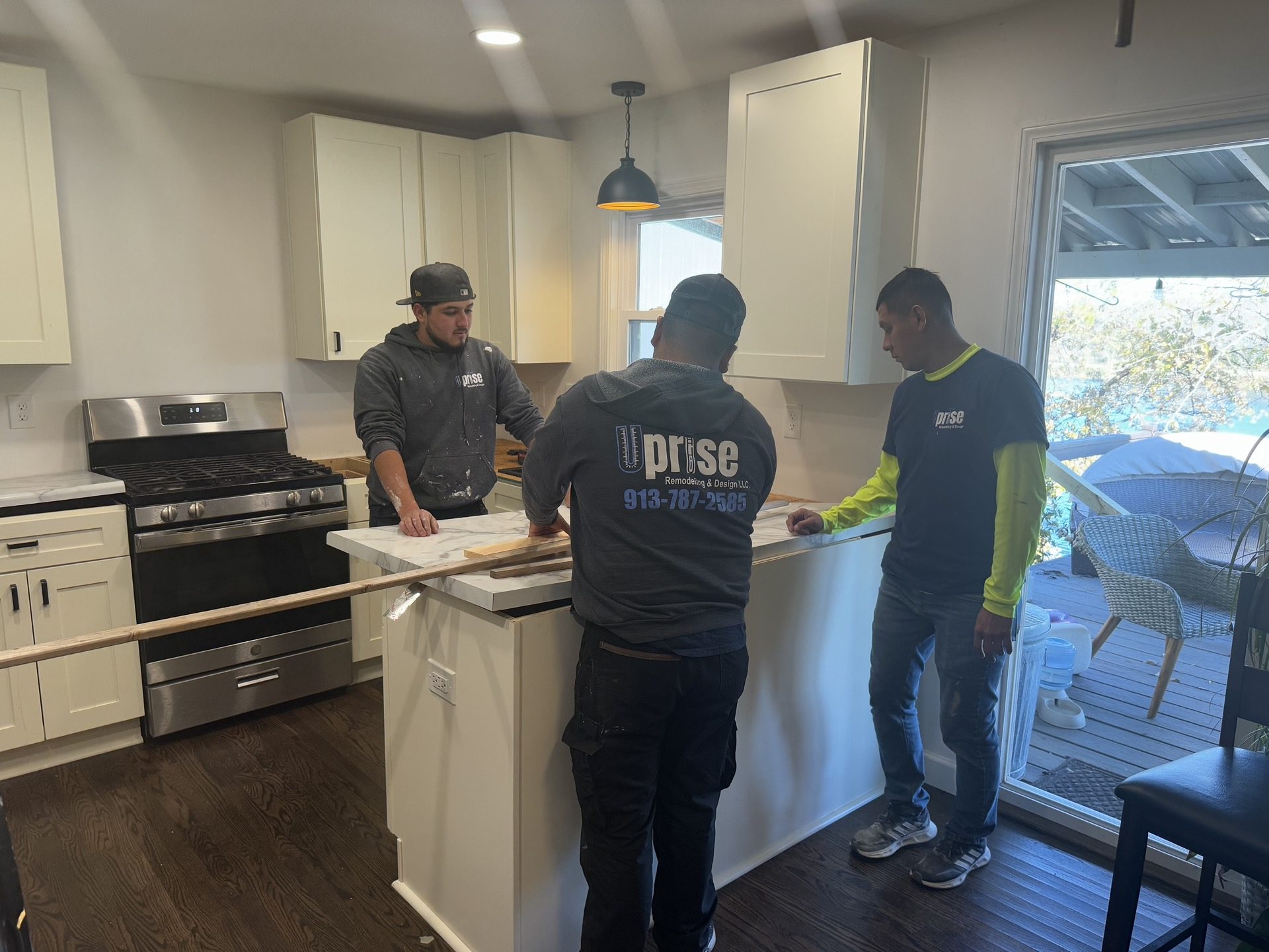 Uprise Remodeling team planning a kitchen remodel